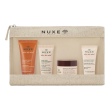 nuxe - trousse voyage rêve de miel - gel doccia 30 ml + balsamo viso 30 ml + latte corpo 30 ml + cr